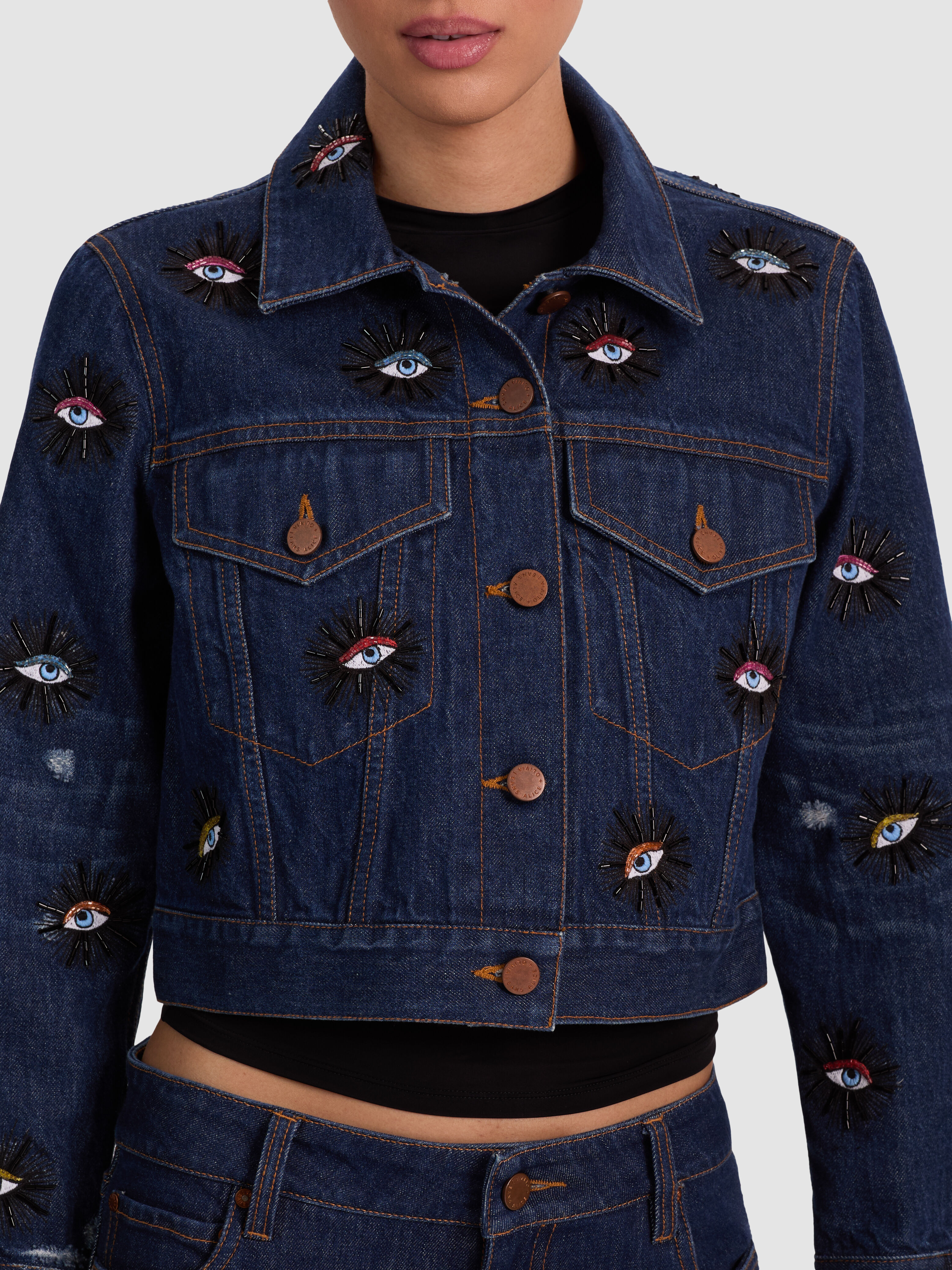 ALICE + OLIVIA Chloe Embellished Denim Jacket in Dark Wash with sparkling beaded eye motifs