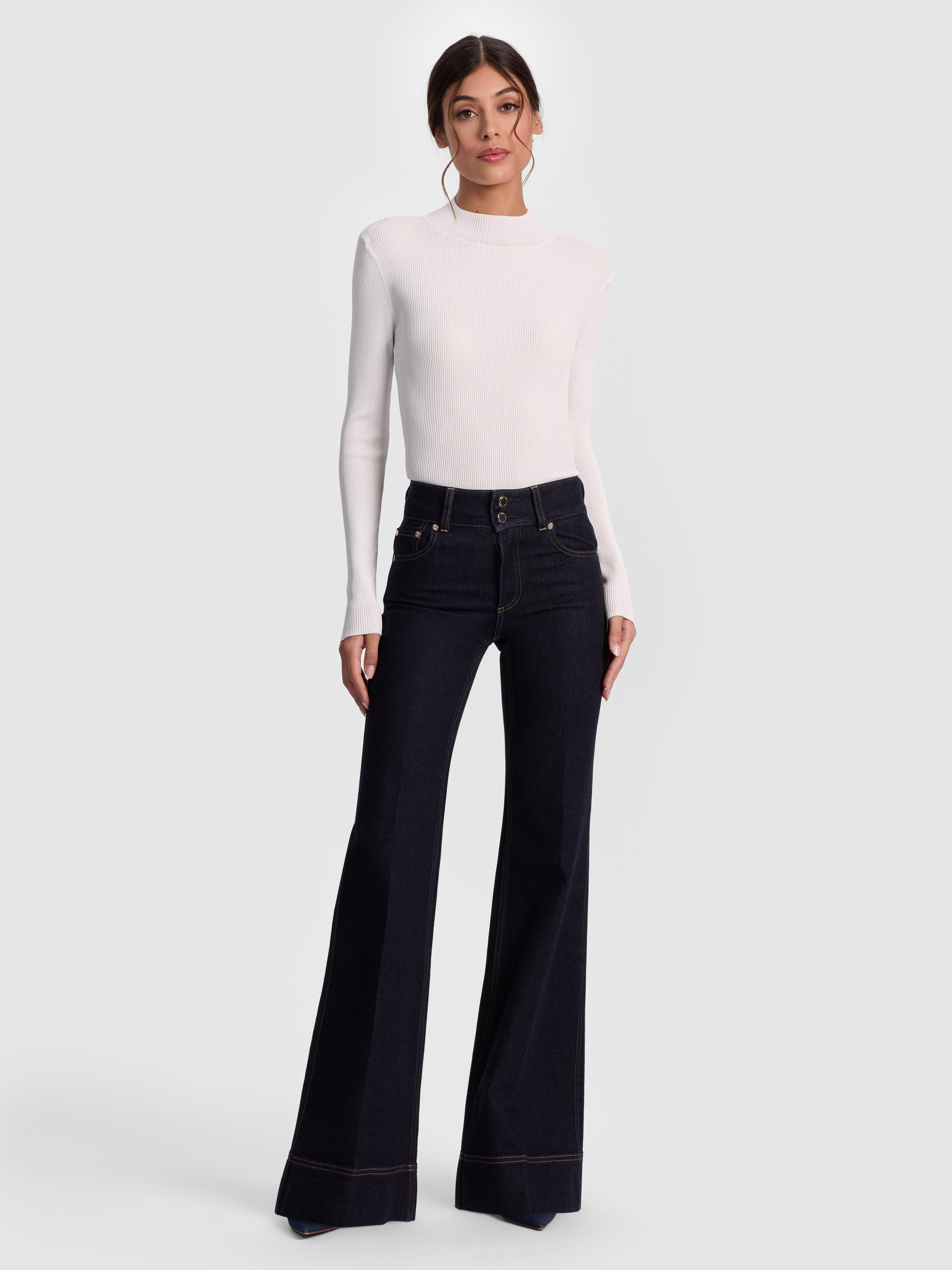 ALICE + OLIVIA Roberta Ribbed Turtleneck in White — slim fitted ribbed knit top with long sleeves