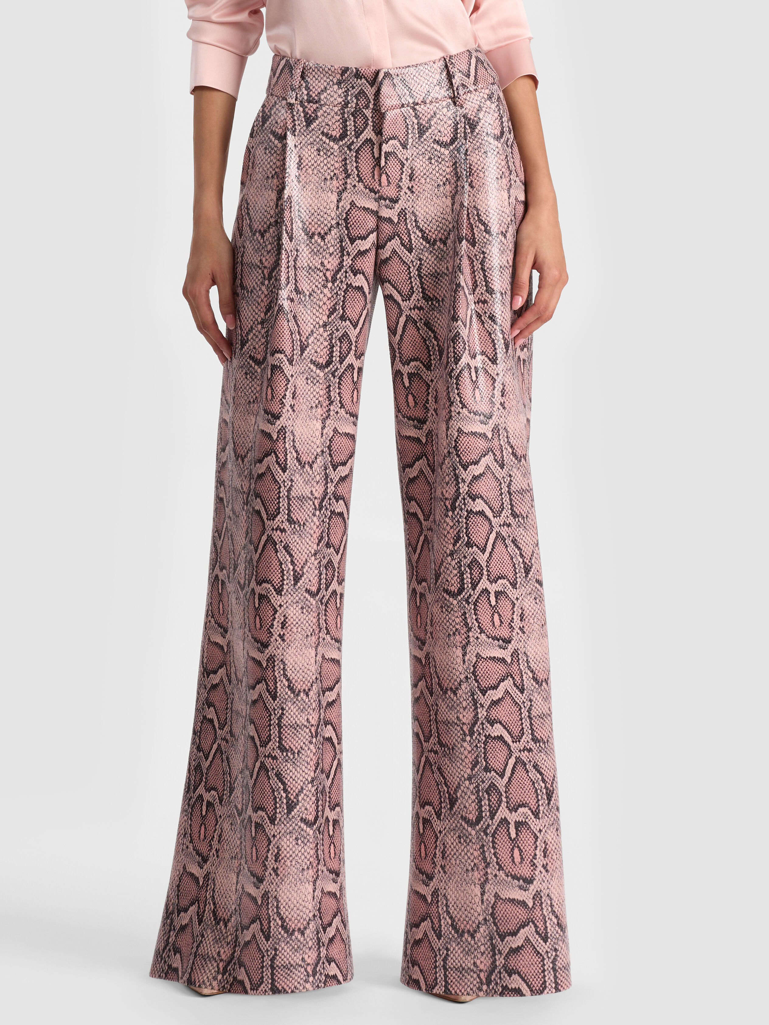 ALICE + OLIVIA Eric Vegan Snakeskin Pant in wide-leg vegan python print as worn by Nia Sioux at NYFW 2025