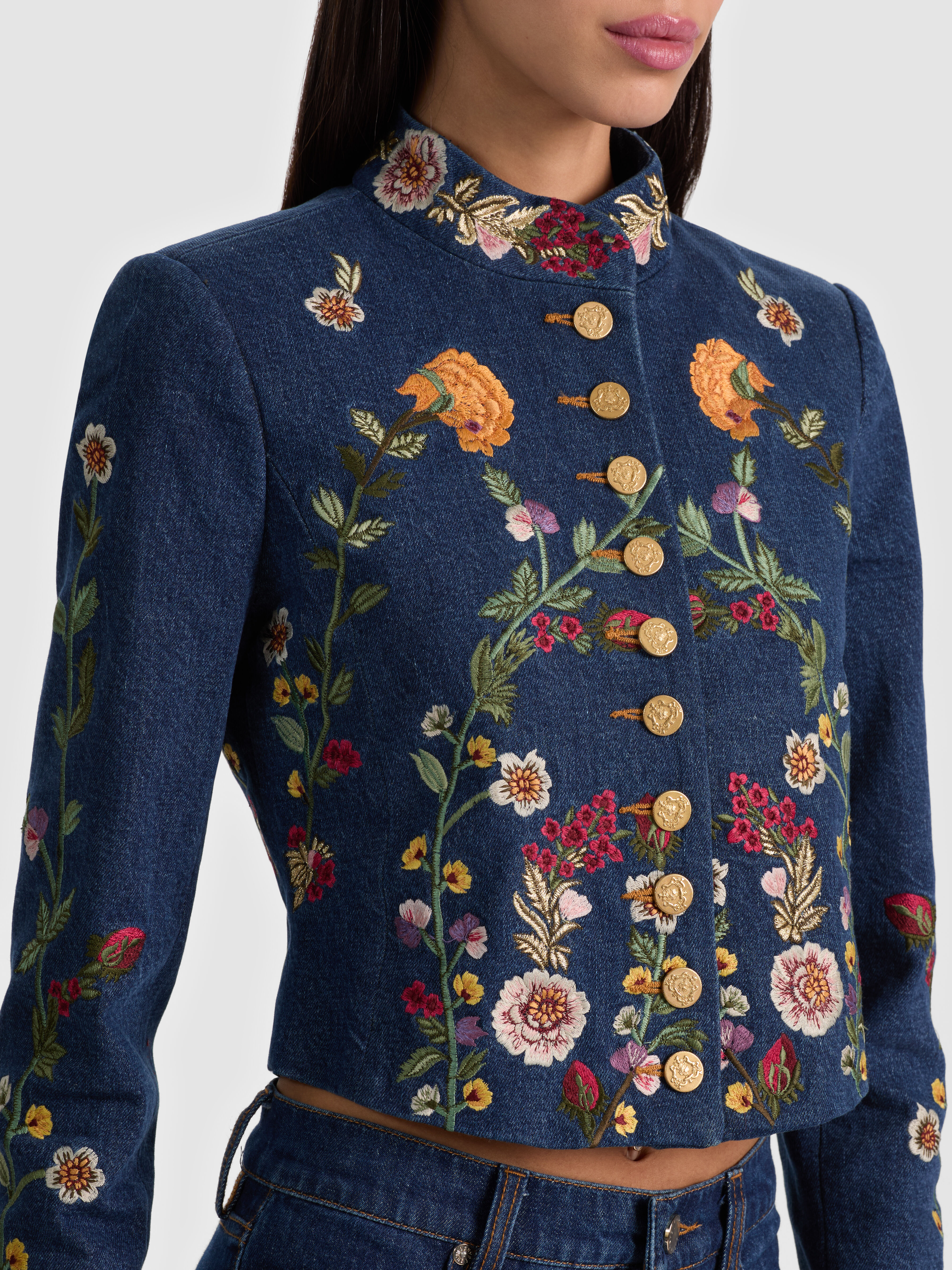 ALICE + OLIVIA Emerson Denim Military Jacket in dark wash with gold button closures and embroidery