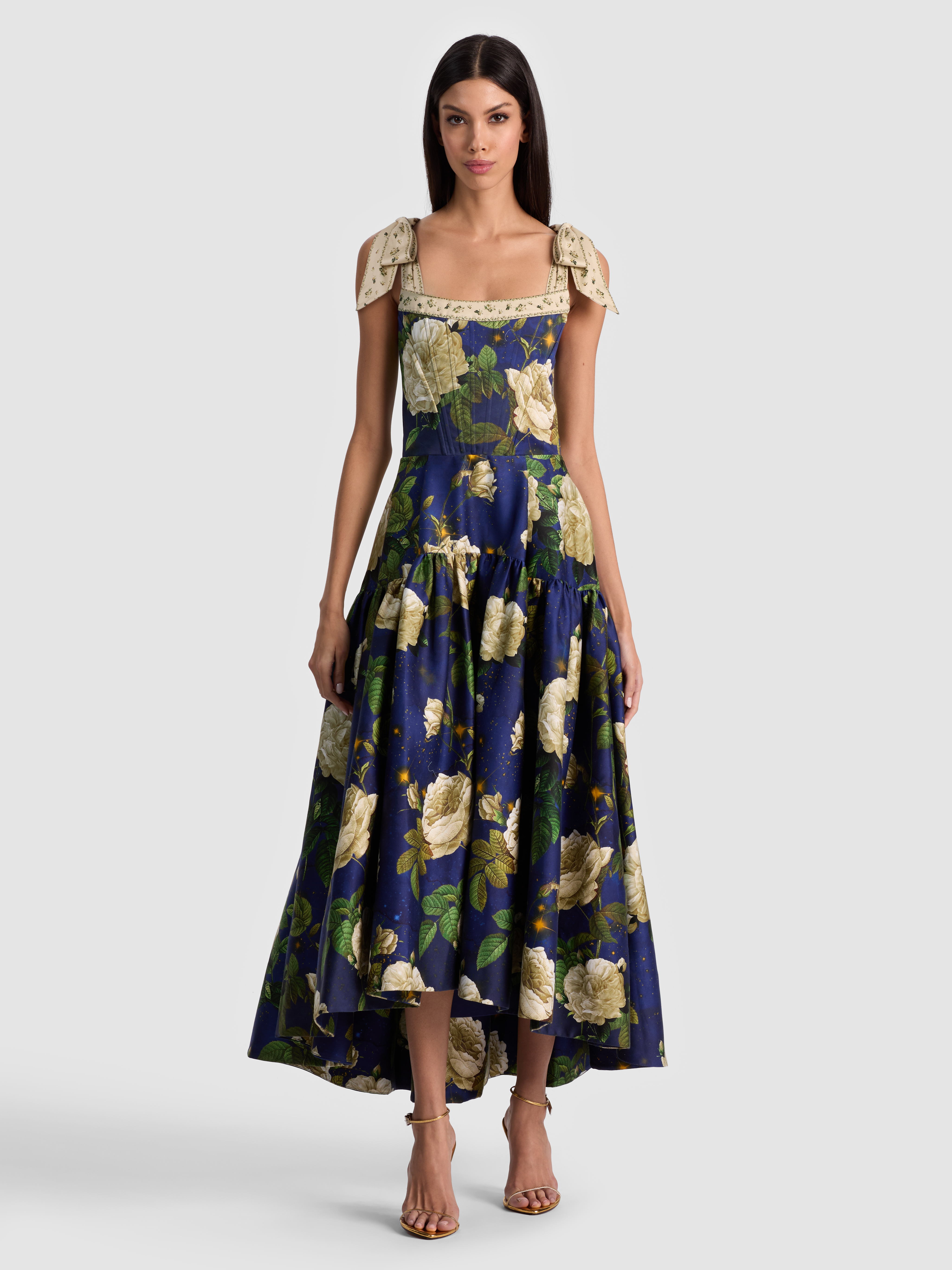 Susie Evans at NYFW 2026: ALICE + OLIVIA Rosalee Midi Dress